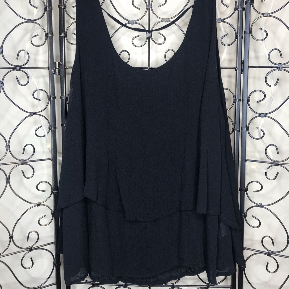 Flowy black tank top with layering detail